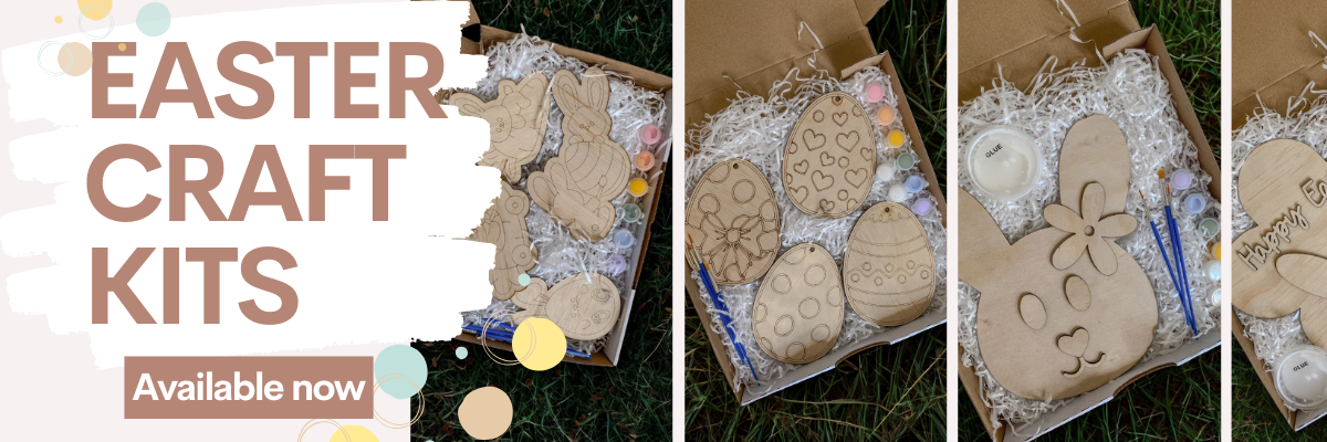 Easter craft kit with bunny shapes and text 'Easter Craft Kits Available now' on a grassy background.